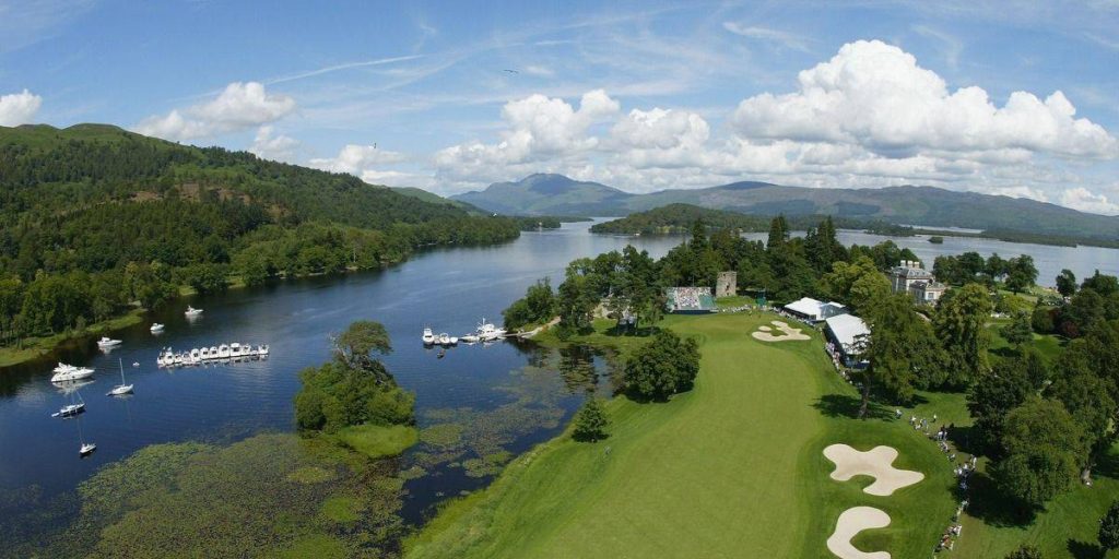 a golf course with a body of water and a body of water